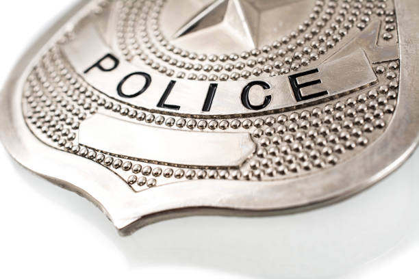 istock Police badge close-up on white background 855749076