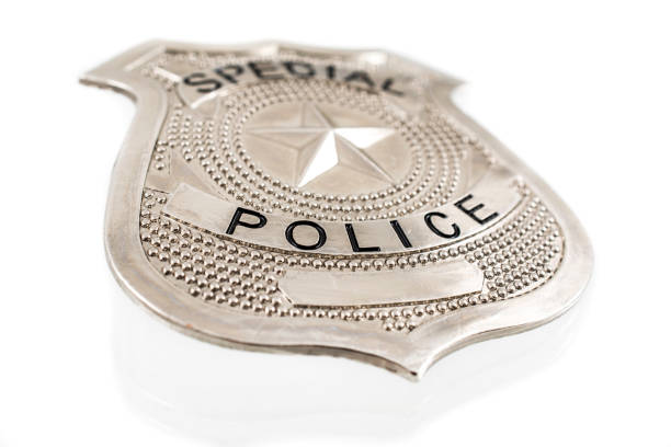 istock Police badge side view on white background 855749152