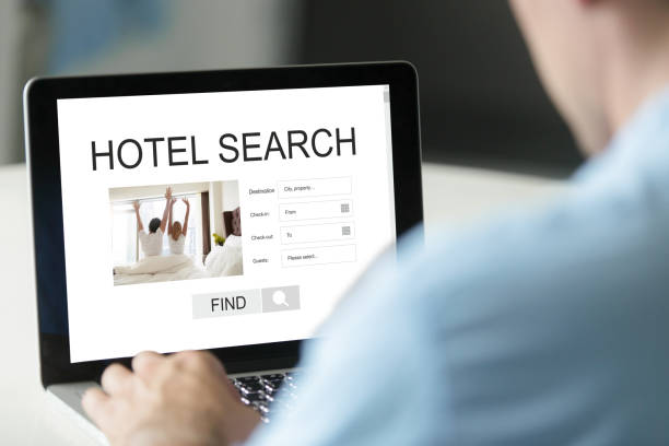 istock Businessman reserving room online, using reservation booking ser 855752974