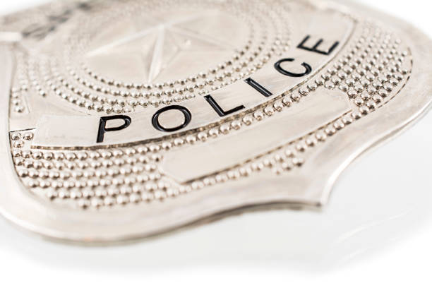 Police badge on white background stock photo