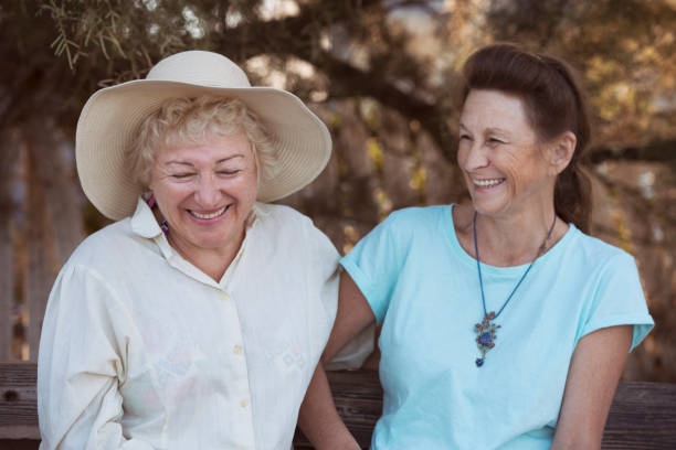 istock Two senior women laughing together. 855755404