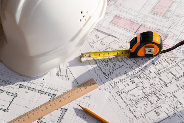 istock In the construction drawing are pencil, helmet and roulette 855764094