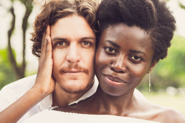 istock Confident young mix-raced couple posing at camera 855775452