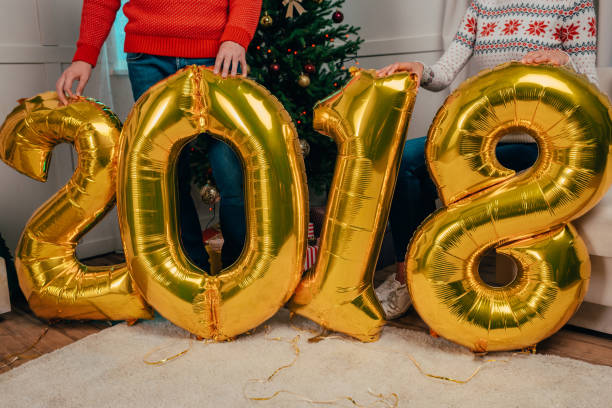 istock couple with new year balloons 855791782