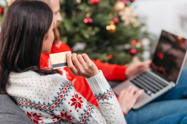 istock couple shopping online at christmas 855795340