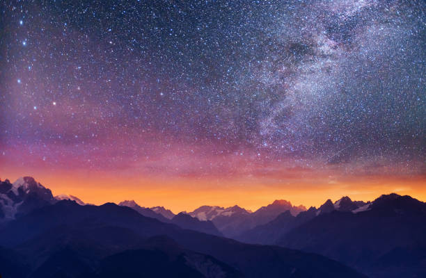 Fantastic starry sky. Thick fog on the mountain pass Goulet. Georgia, Svaneti. Europe Fantastic starry sky. Thick fog on the mountain pass Goulet. Georgia, Svaneti. Europe. Caucasus mountains spectacular view stock pictures, royalty-free photos & images