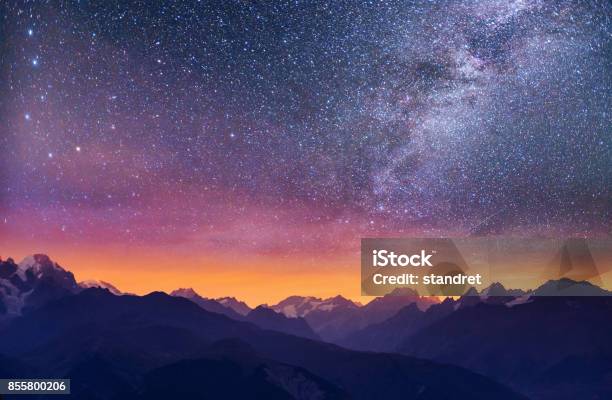 Fantastic Starry Sky Thick Fog On The Mountain Pass Goulet Georgia Svaneti Europe Stock Photo - Download Image Now