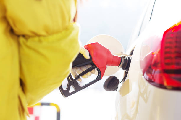 istock gas gun with car 855806678