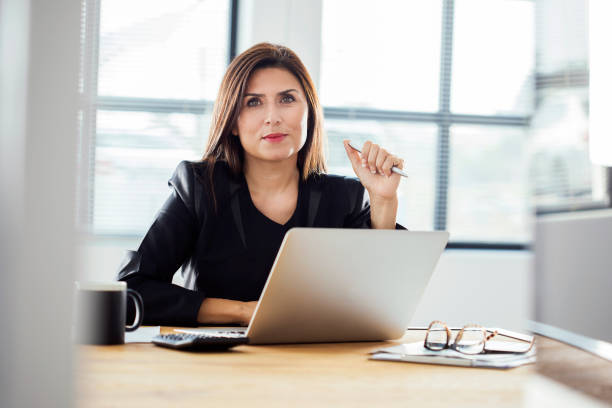 istock Businesswoman working in the office 855807976