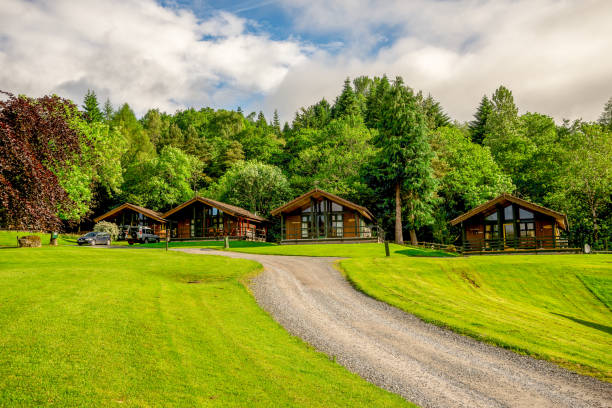 Rental holiday wooden lodges at Loch Tay lake in central Scotland, Great Britain stock photo