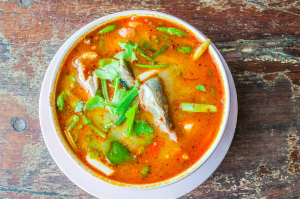 tom yum soup on grunge wooden table