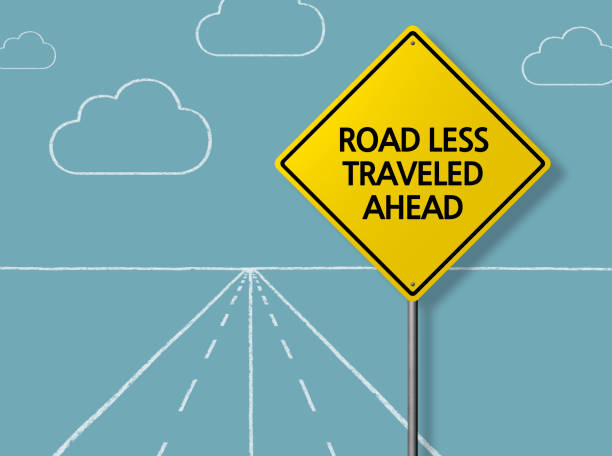 istock ROAD LESS TRAVELED AHEAD - Business Chalkboard Background 855820098