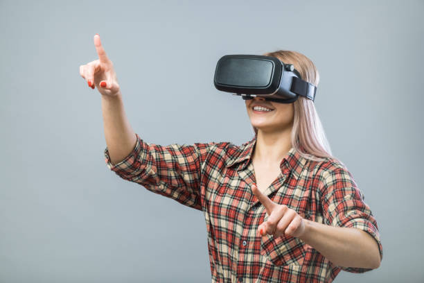 istock Pretty girl in virtual reality 855825480