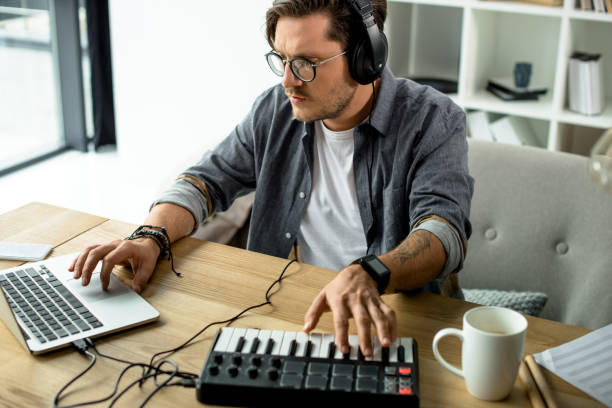 istock sound producer working at modern office 855828724