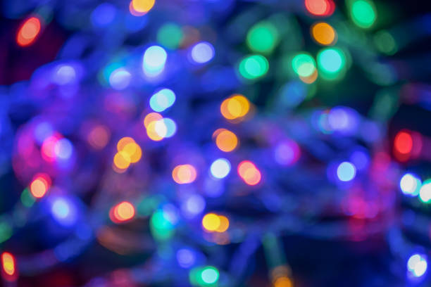 istock Blurred and defocused christmas colorful lights abstract background 855828744