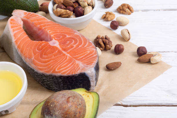 istock Healthy food vegetables , nuts and salmon 855829330