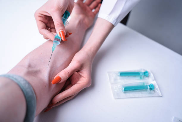 istock Doctor doing an injection to a patient 855843402