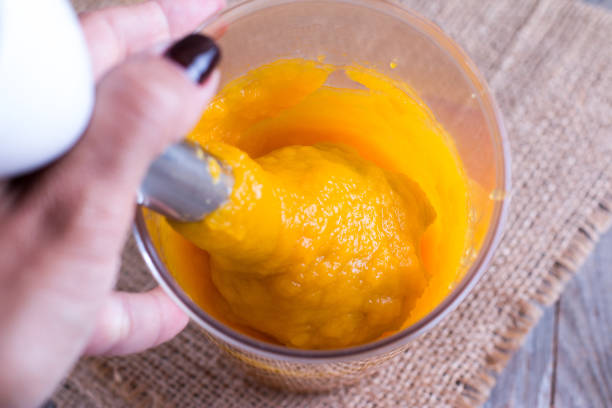 istock Pumpkin puree in the blender bowl 855847980