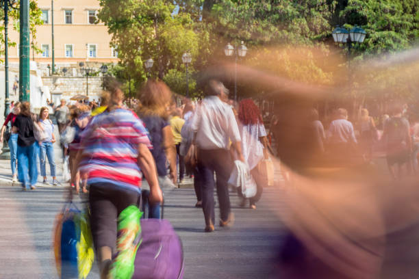 istock Blurry people walking in the street 855847996