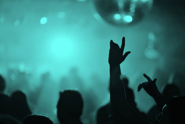 istock Hands of people in a nightclub 855848188