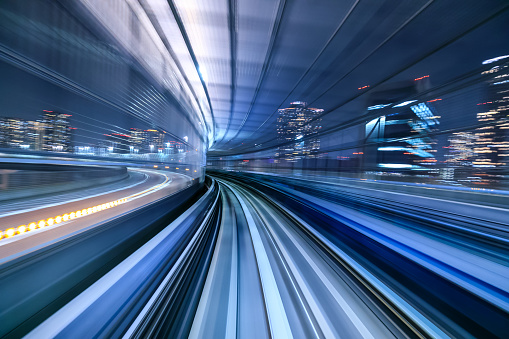 Motion blur of train moving inside tunnel in Tokyo, Japan