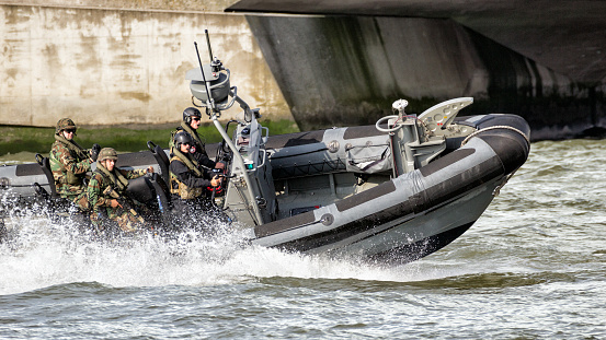 ROTTERDAM, NETHERLANDS - SEP 3, 2016: Fast speedboat with Dutch Marines during an assault demo at the World Harbor Days in Rotterdam.