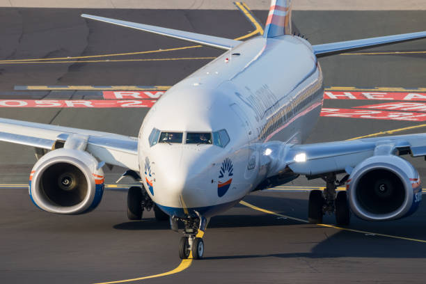 Eurowings SunExpress Boeing 737 DUSSELDORF, GERMANY - DEC 16, 2016: Eurowings SunExpress Boeing 737 aircraft taxiing after landing at Dusseldorf airport sunexpress stock pictures, royalty-free photos & images