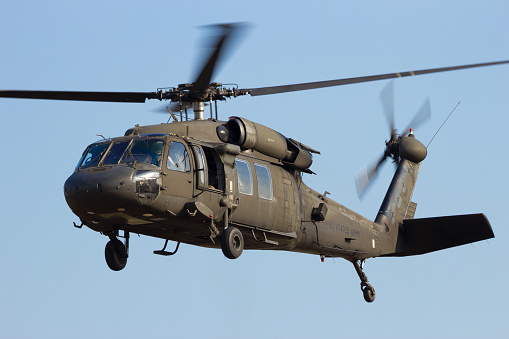 GRAVE, NETHERLANDS - SEP 17, 2014: American Army Blackhawk helicopter taking off.