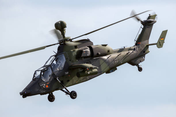 Eurocopter Tiger attack helicopter BERLIN - JUN 2, 2016: German Army Eurocopter EC665 Tiger attack helicopter flyby during the Berlin Airshow ILA at Berlin-Schoneveld airport german armed forces stock pictures, royalty-free photos & images