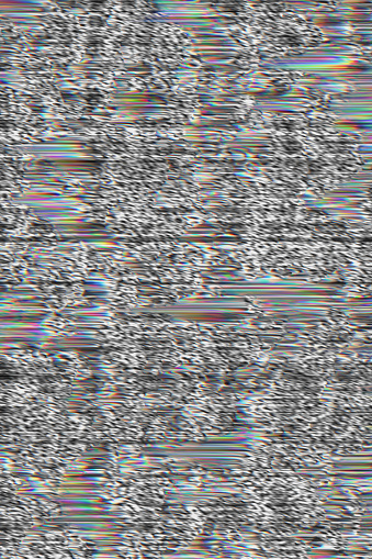 Digital television interference pattern caused by bad satellite signal interference. Glitch aesthetic.