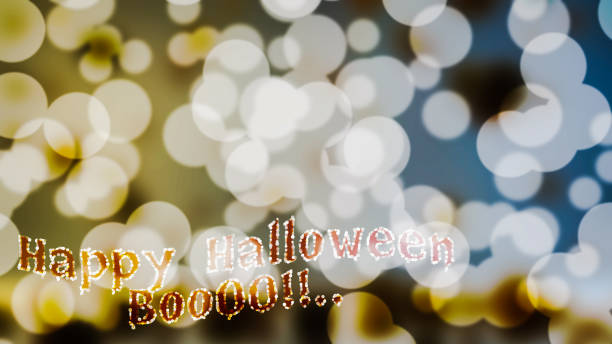 istock white blue gold abstract Background with blur bokeh light effect.and Halloween word 855879554
