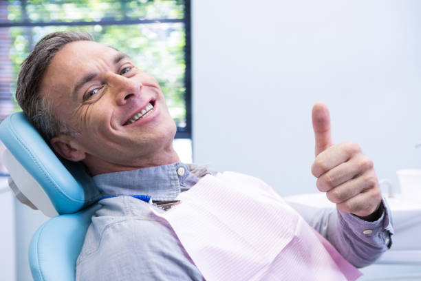 istock Portrait of smiling man showing thumbs 855879942