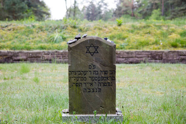 Bergen-Belsen, Germany, May 20 - 2017:  Symbolic Jewish gravestone on the grounds of former concentration camp Bergen-Belsen in Germany where 70.000 died during World War II.