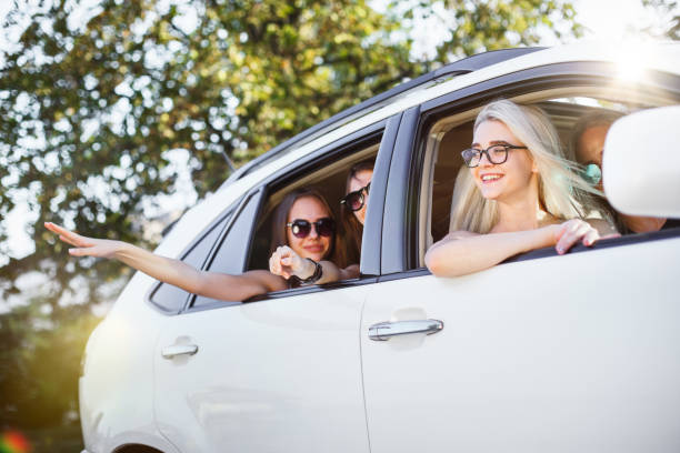 istock The young women in the car smiling 855892192