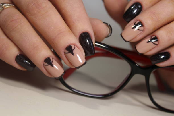 istock Beautiful manicure design and glasses 855895248