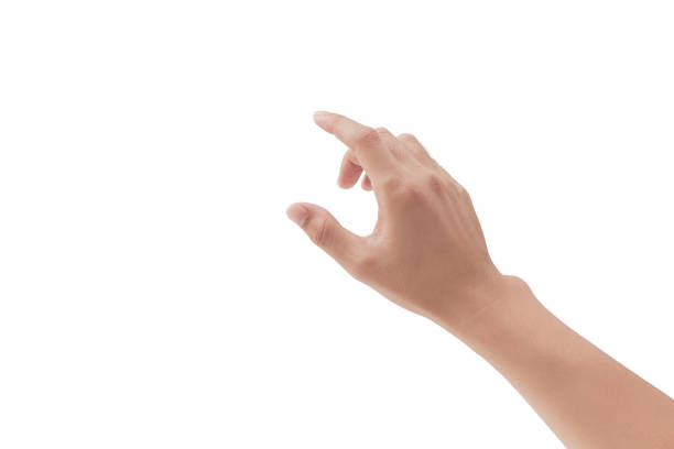 una mano tocando algo como un dispositivo de botón o pantalla en fondos blancos, aislado - human finger fotografías e imágenes de stock