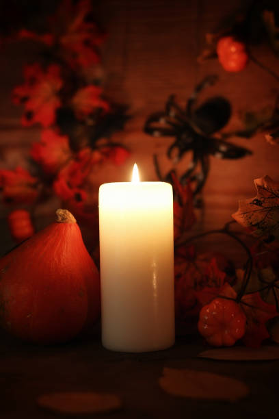 istock table decorations for Halloween carved pumpkin head candles 855899306