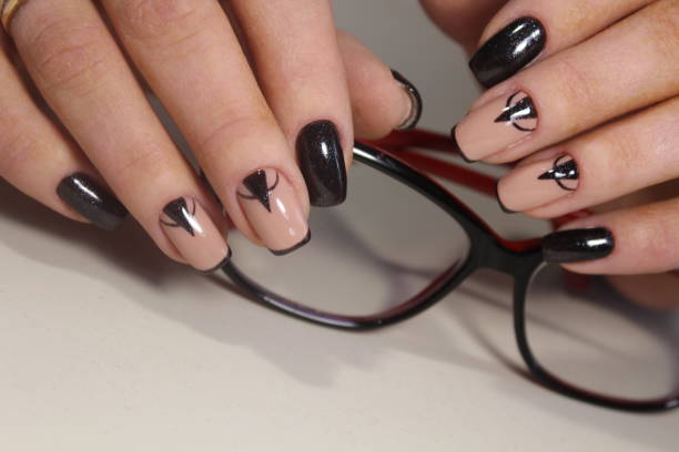 istock Beautiful manicure design and glasses 855899510