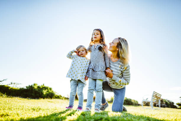 istock happy family have fun in the park 855909692