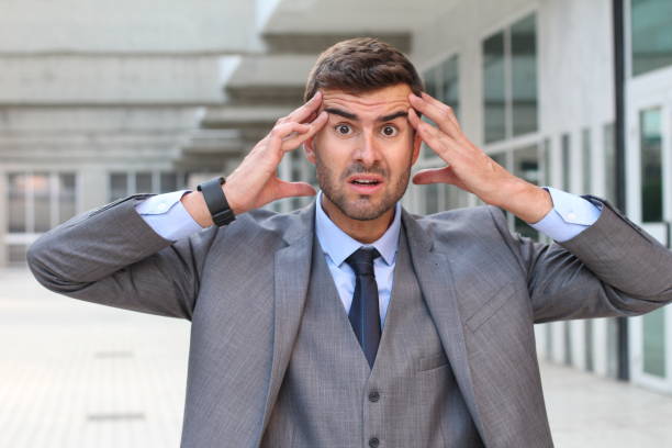 istock Forgetful businessman realizing a major mistake 855913238