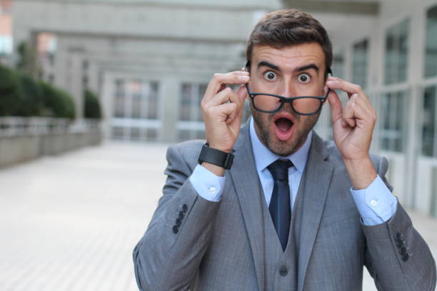 istock Surprised man with glasses close up 855913574