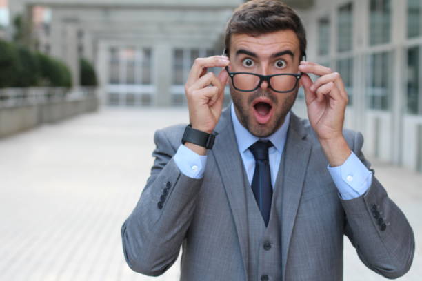 istock Surprised man with glasses close up 855913578