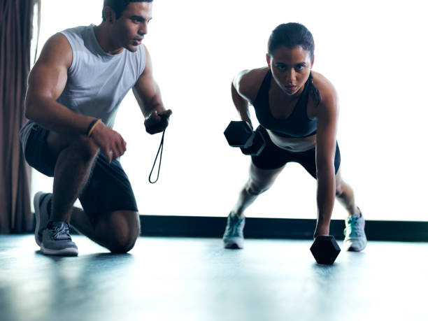istock Bulking up those biceps one rep at a time 855913996
