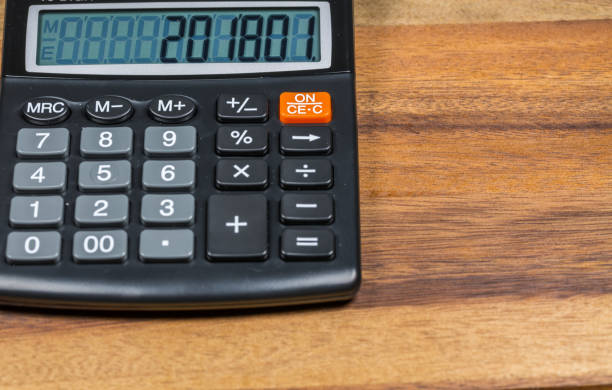 istock Calculator with New Year date on display 855935026