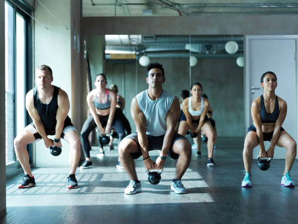 istock The staple of exercise - squats 855938912