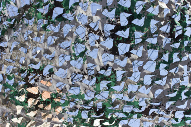 istock Abstract textile shade pieces over sky as background 855939624