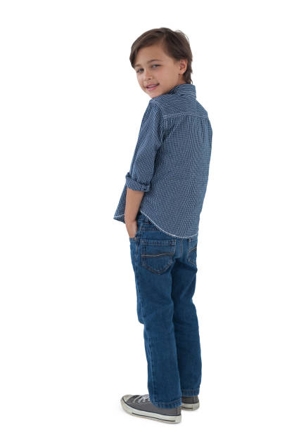 istock Boy posing with hands in pocket against white background 855940424