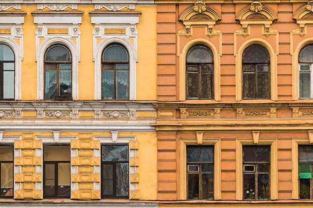 istock Two different buildings adjacent tightly to each other 855947860