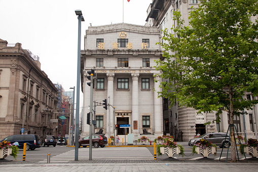 Shanghai,China - June 27,2016 : The old and classic building and traffic road on the Bund in Shanghai,China on June 27,2016.