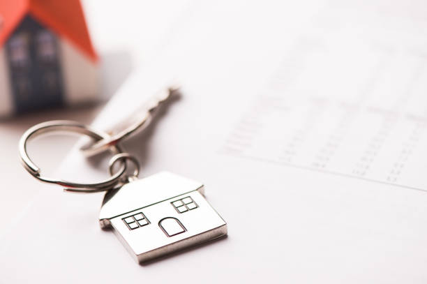 istock mortgage loan agreement  and model house 855962388